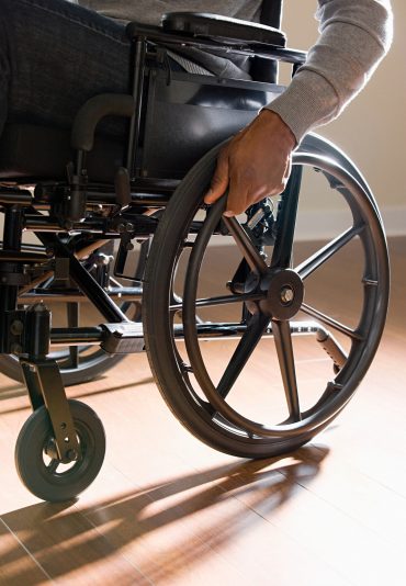 Close up of a disabled man in a wheelchair